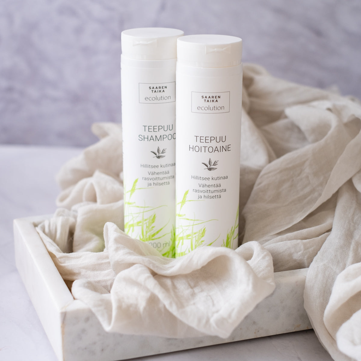 Nestemäinen Teepuuhoitoaine, hilseelle, kutiavalle päänahkalle, normaaleille ja rasvoittuville hiuksille, luonnollinen, silikoniton, parabeeniton, 200ml - Saaren Taika Ecolution